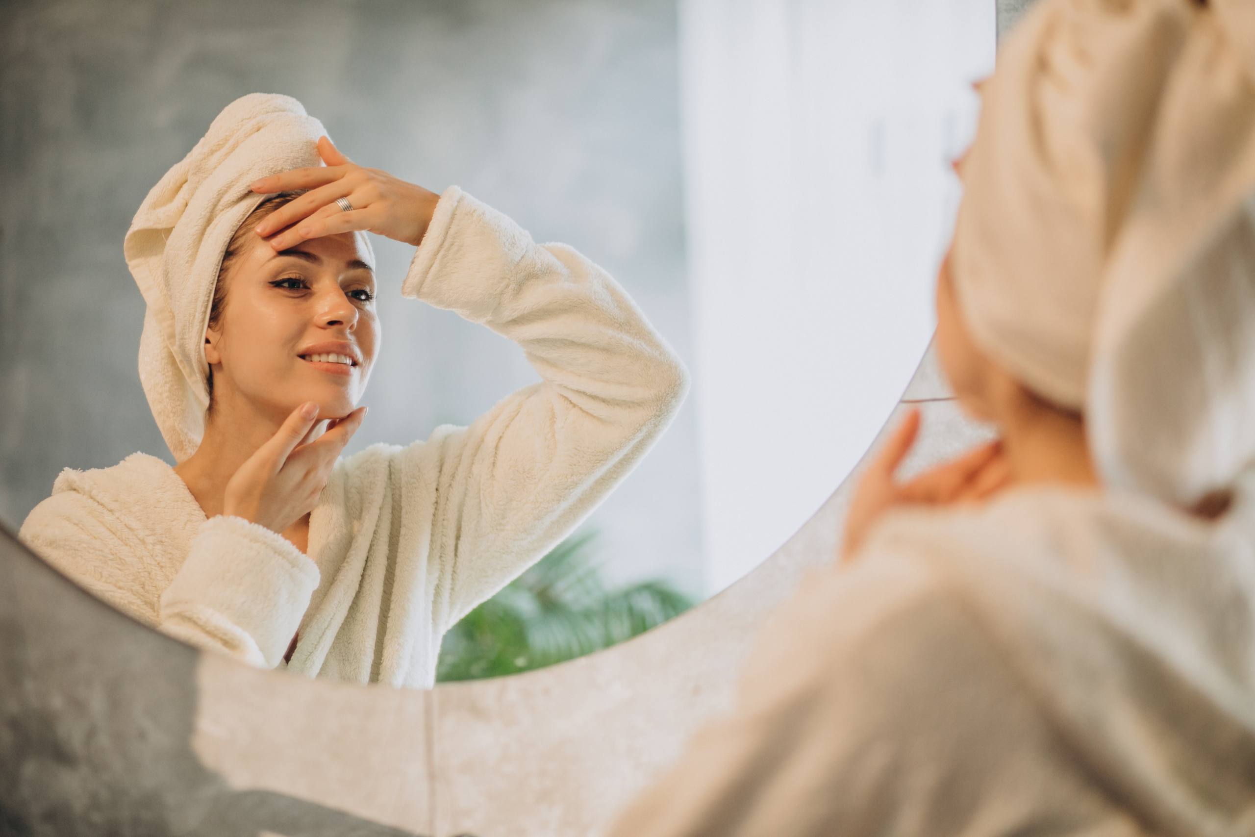 woman home applying cream mask woman home applying cream mask
